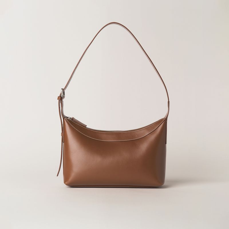 Clean lines and a warm brown finish on an everyday shoulder bag