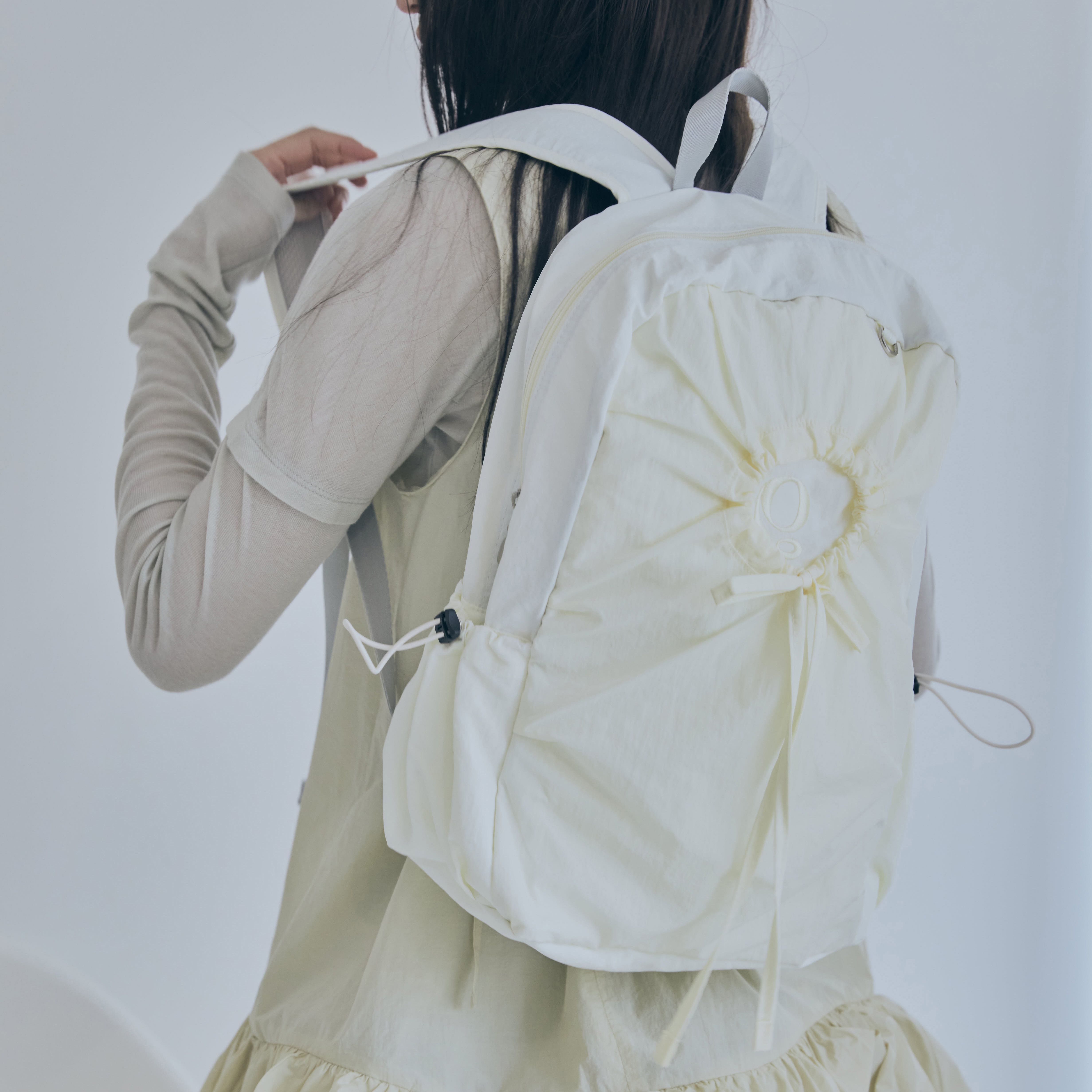 [POIE] hole string PO backpack ( light yellow) ★韓國 Designer fashion, Seoul-fully created | W Concept
