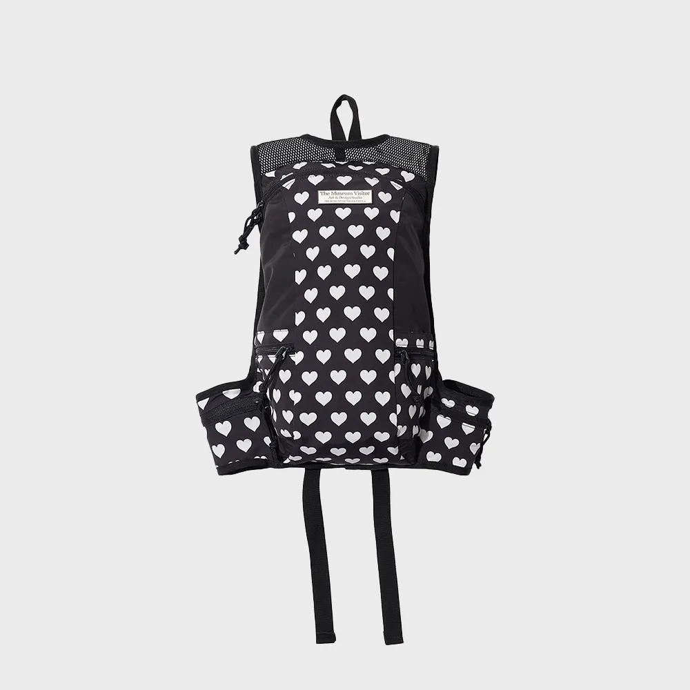 韓国商品/THEMUSEUMVISITOR MESH HEARTPRINTEDBACKPACK THE MUSEUM VISITOR