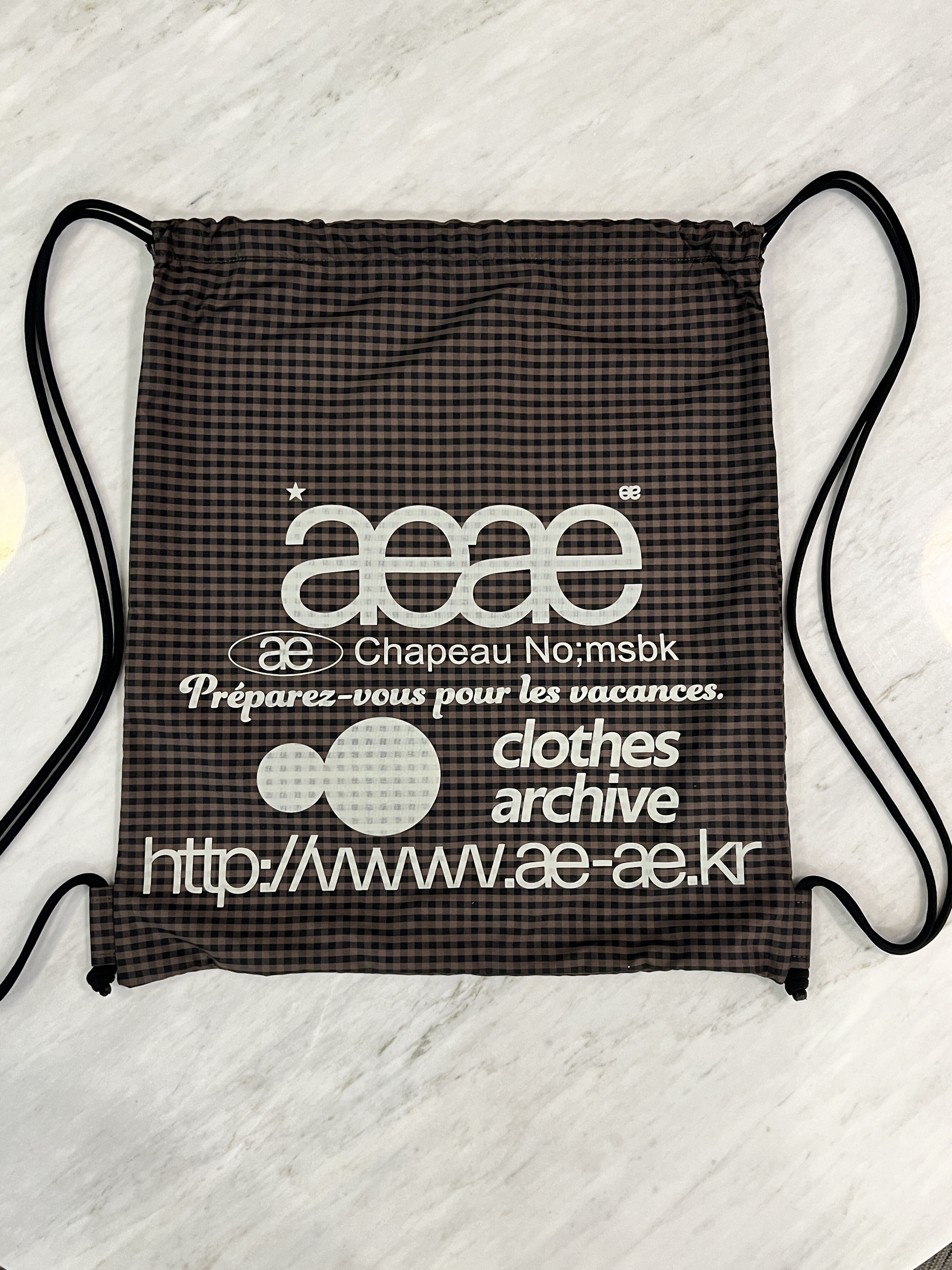 WEB LOGO CHECK GYM SACK [BROWN] - 감도 깊은 취향 셀렉트샵 29CM